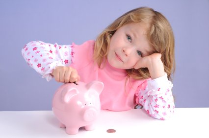 Little girl piggy bank