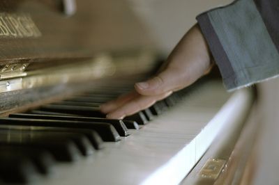 Hand playing piano