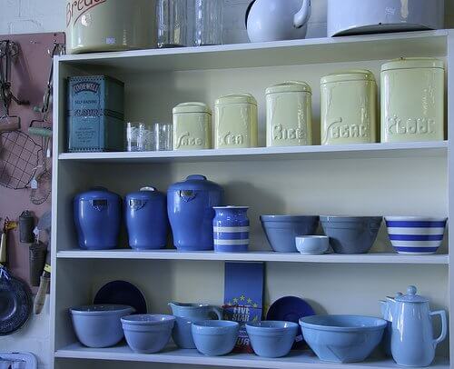 blue dishes on kitchen shelf