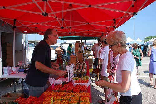 vendor talking farmers market