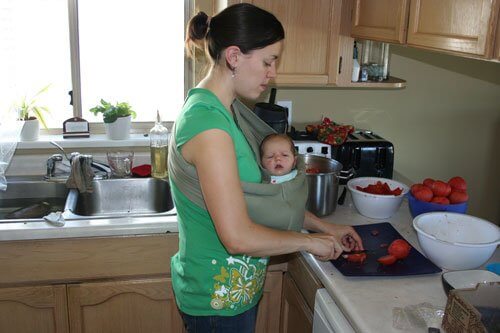 me canning tomatoes with jo in sling