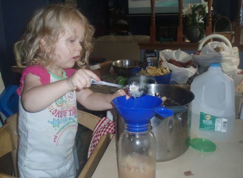 https://keeperofthehome.org/wp-content/uploads/2010/09/Bekah-scooping-applesauce.jpg