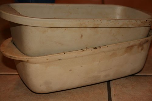 dirty stoneware breadpans stacked