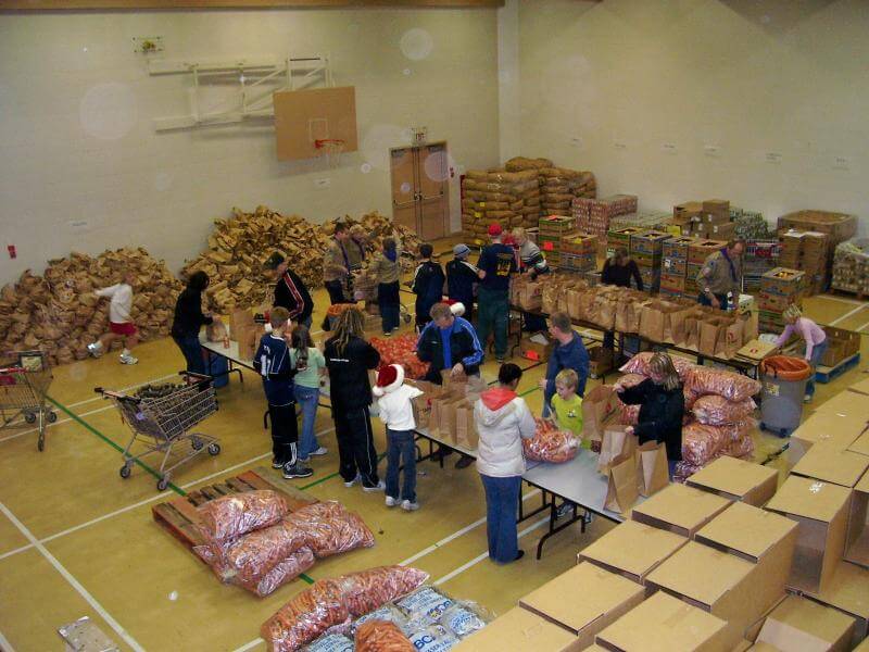 Christmas hampers being put together in a community near our home