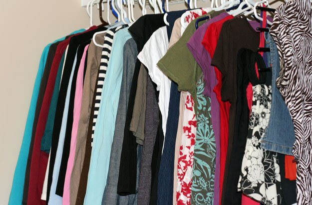 clothes in closet after organizing