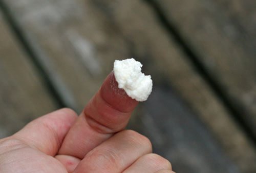 sunscreen on finger