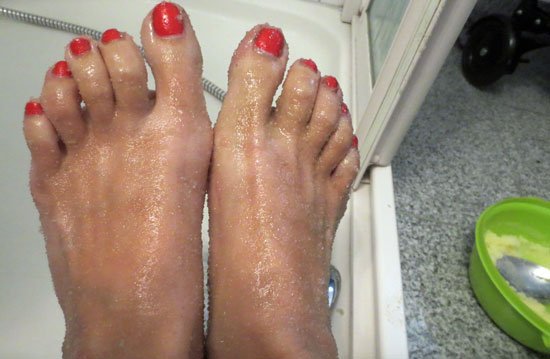 feet with scrub on them