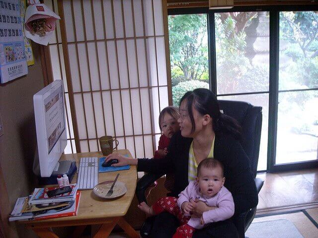 mom with kids working