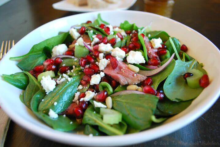 Spinach salad withpine nuts pomegranate and feta edited