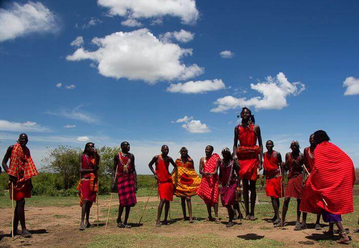 masai men jumping and dancing
