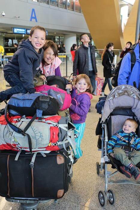 In Kunming, China, our kids sit on all our worldly possessions, for one year, for six people.