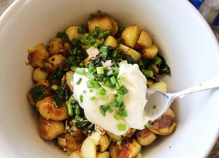 Warm potato salad with bacon, asparagus and swiss chard. Forget the hard boiled eggs. This is now my favorite version of potato salad, ever.  {via Keeper of the Home}