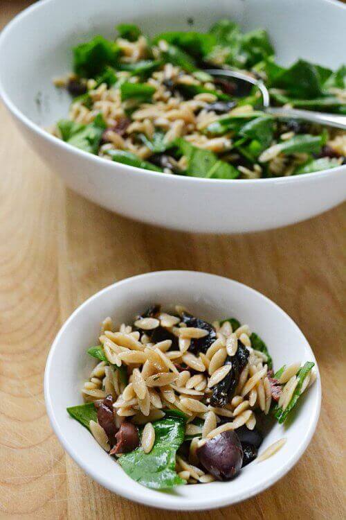 I love this recipe for orzo salad with spinach and sun dried tomatoes for many reasons. The dressing is simple, but the mediterranean flavors are always crowd pleasing! 