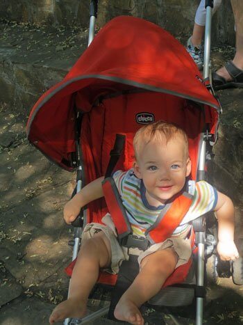 A happy baby in his stroller in Argentina, about 11 mths old.