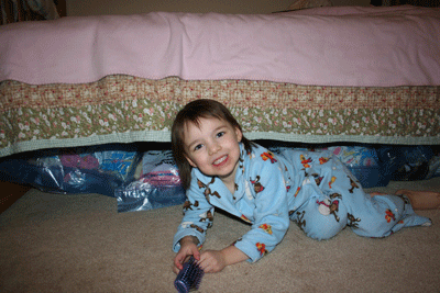 Abbie-and-bags-under-bed
