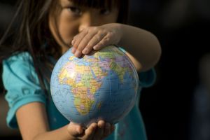 Girl holding earth