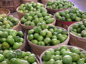 Apples in baskets at market