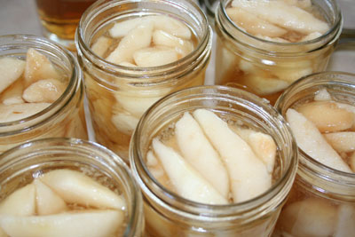 Open-jars-of-pear-canning