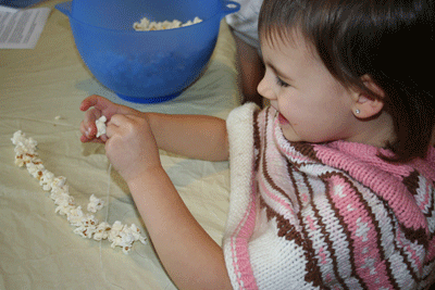 Abbie-strings-popcorn